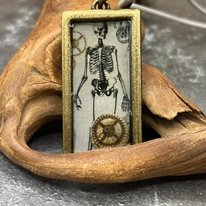 Reliquary of Ash & Bone Brass Skeleton Pendant – Memento Mori Inspired Jewelry Resin Tray