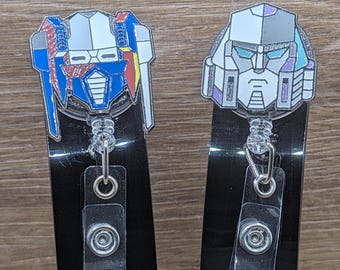 Portachiavi digitale retrattile con clip a coccodrillo, personaggi Transformers Soundwave e Starscream, con clip da bavero, disponibile in vari colori.