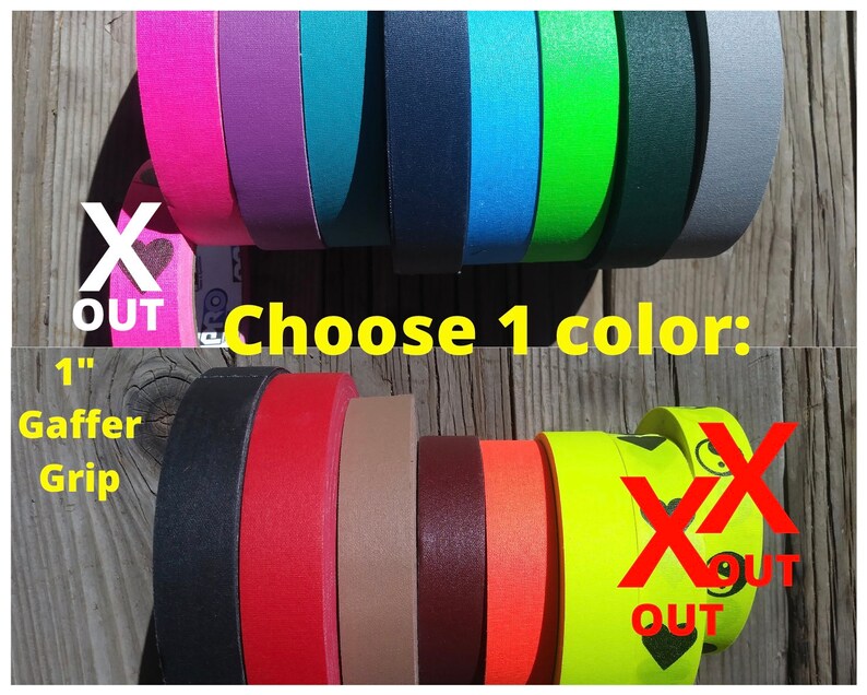 May include: A selection of Gaffer Grip tape rolls in a variety of colours, including pink, purple, teal, navy, green, and grey. The image also shows rolls of black, red, tan, brown, and orange tape. Text reads "Choose 1 colour: 1" Gaffer Grip."