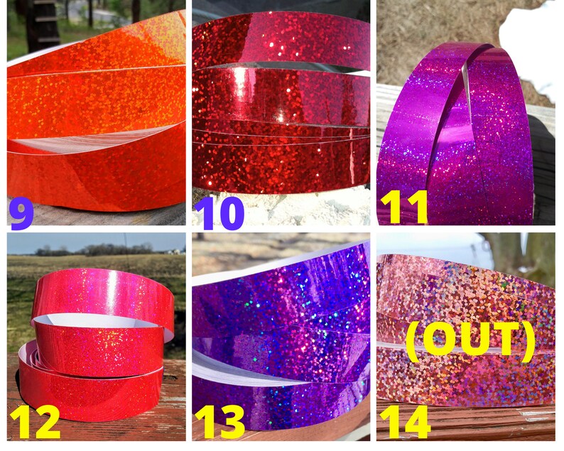 May include: A selection of glitter tape rolls in shades of orange, red, pink, purple, and blue. The tape is arranged in a circular shape, highlighting the glittery texture. The number 14 is labeled as "(OUT)".