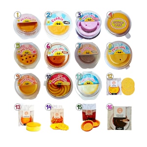 May include: A collection of pre-made baked goods, including pie crusts, cookies, party cakes, and cheesecake. The items are packaged in clear plastic containers and paper bags, with labels indicating the type of dessert. The image showcases a variety of flavors and styles.