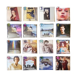 May include: A collection of sixteen square music album covers arranged in a four-by-four grid, each labeled with a numbered circle from one to sixteen. The covers feature various artists, including Sting, Shawn Mendes, Imagine Dragons, and Fall Out Boy.