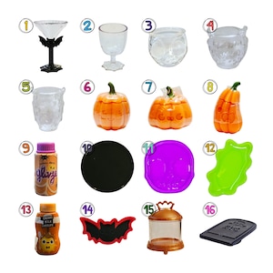 May include: A collection of sixteen miniature Halloween-themed items including clear plastic glassware, orange pumpkin-shaped containers, a bottle labeled glaze, a black circular disc, a purple skull tray, a green slime shape, and a black tombstone.