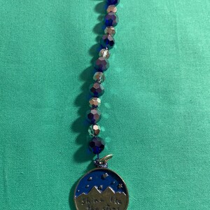 Bead ornament with mountain