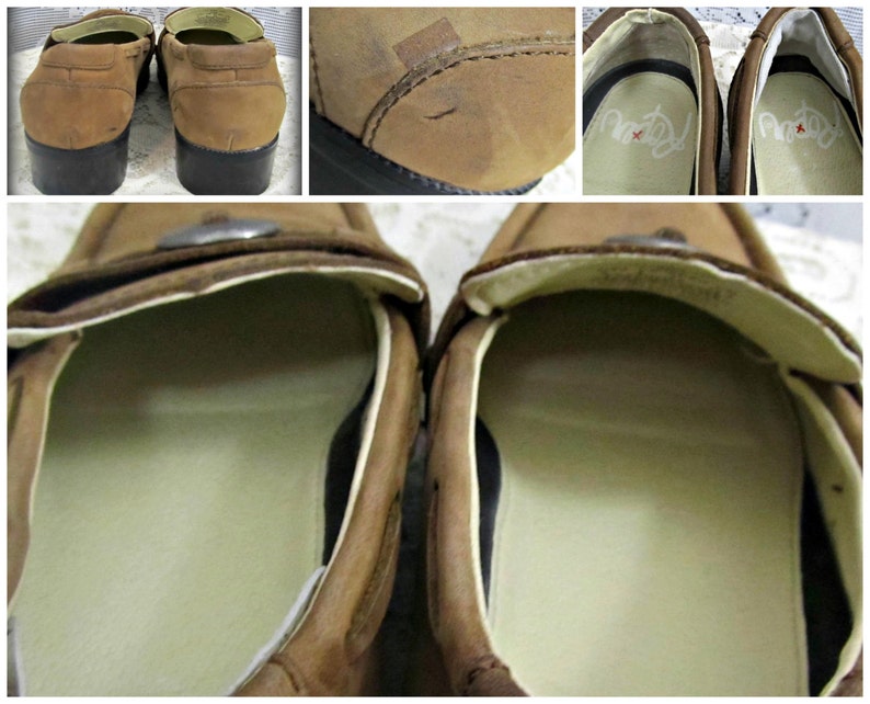 May include: A pair of brown leather loafers with a silver buckle on the top. The loafers have a white lining and a black rubber sole.