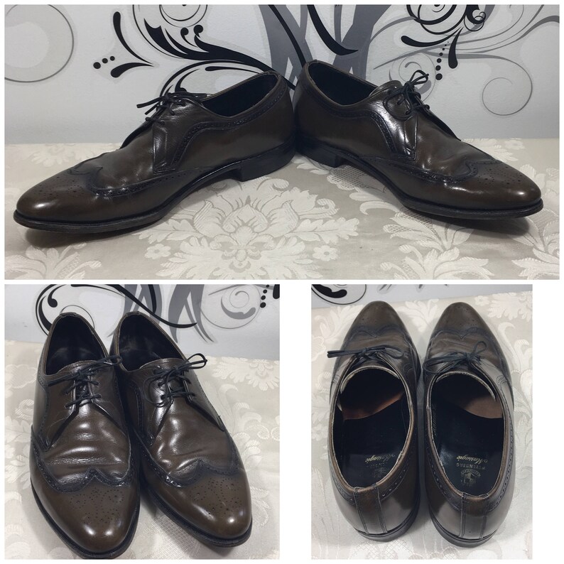 May include: Four brown leather oxford shoes with wingtip detailing and lace-up closures. The shoes have a brogue pattern and a polished finish.