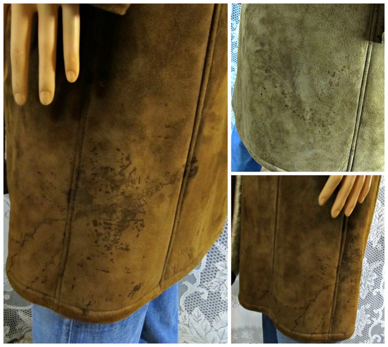 May include: A brown suede coat with a long length and a collar. The coat has a few stains on the front.