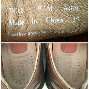 May include: Close-up of the inside of a brown leather shoe. The shoe is size 9 1/2 M and says "Made in China" on the insole. The insole also says "Leather upper/man made sole".