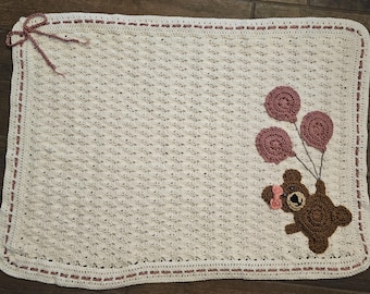 Balloons and baby bear blanket