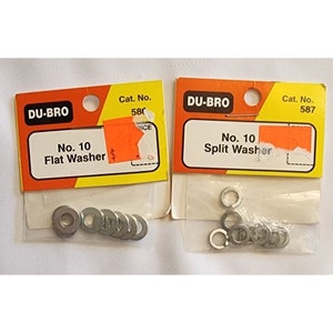 May include: Two packages of metal washers, one labeled "DU-BRO No. 10 Flat Washer" and the other labeled "DU-BRO No. 10 Split Washer".