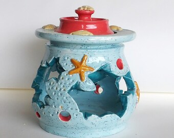 double walled ceramic keepsake jar with inner chamber, pink and blue seashore motif