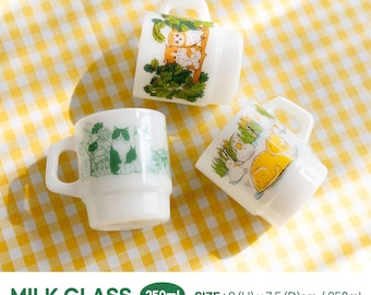 May include: Three white milk glass mugs with different animal illustrations. The mugs are 250ml and measure 9 inches tall by 7.5 inches in diameter.  The mugs are on a yellow and white checkered tablecloth.