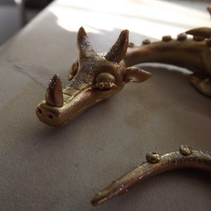 Little sleepy gold dragon image 3