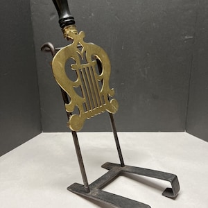 Vtg  regency brass and iron lyre-form fireplace trivet iron wood handle