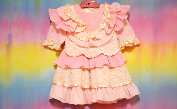 pink frilly baby dress