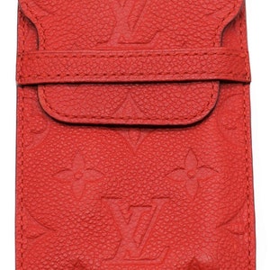 Monedero pequeño con solapa Empreinte en relieve rojo Aurore de Louis Vuitton