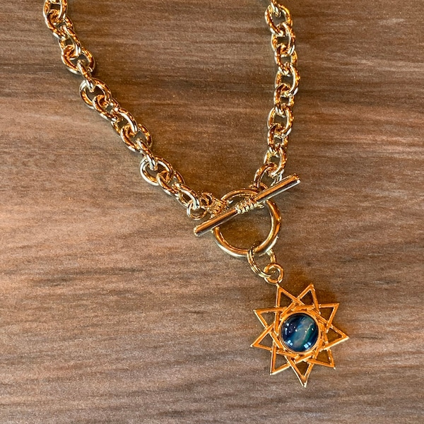 Nine Point Star Gold plated toggle bracelet with blue paua shell cabochon, Symbology Bahai 9 Completeness and Perfection