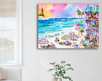 Könnte beinhalten: Ein Aquarellbild, das eine Strandszene mit bunten Sonnenschirmen, Menschen und einem Leuchtturm in der Ferne zeigt. Der Himmel ist in leuchtendem Rosa und Orange gehalten, das Meer in strahlendem Blau. Das Bild ist gerahmt und bereit zum Aufhängen.