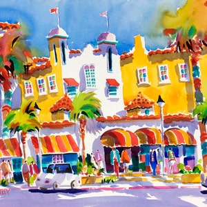 May include: A watercolor painting of a yellow building with red and white striped awnings. The building has palm trees in front of it and people walking by. The painting is signed "ELLEN NECKEY".