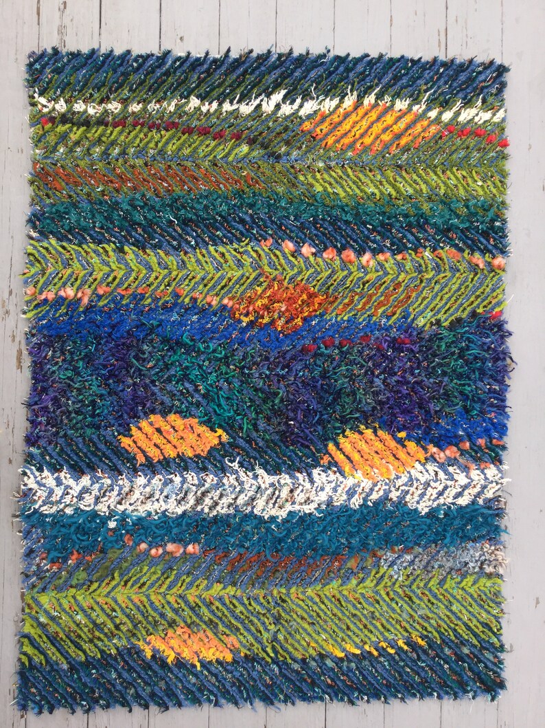 abstract multi color machine made rug