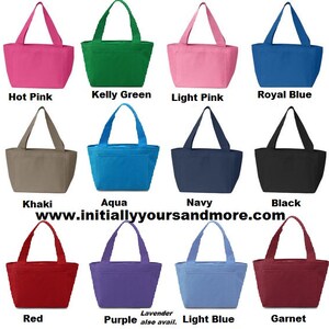 May include: A set of 12 insulated lunch bags in various colors, including hot pink, kelly green, light pink, royal blue, khaki, aqua, navy, black, red, purple, light blue, and garnet. The bags have a simple design with a single pocket on the front and a top handle.