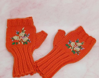 orange wrist warmer with embroidery