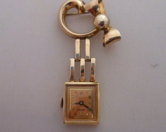 rose gold crawford brooch watch, nurses watch
