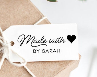 May include: A white gift tag with black text that reads "Made with ♥ by Sarah" tied to a brown gift box with twine.