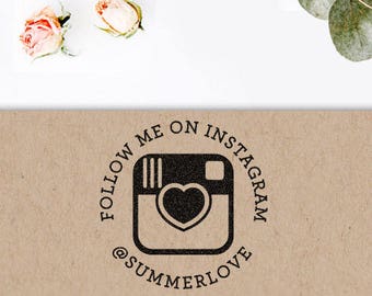 May include: A brown paper envelope with a black rubber stamp that says "Follow me on Instagram @summerlove" with a camera icon and a heart.