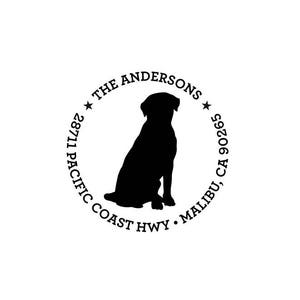 May include: Black and white silhouette of a dog sitting in a circle with the text "The Andersons 28711 Pacific Coast Hwy. Malibu, CA 90265"