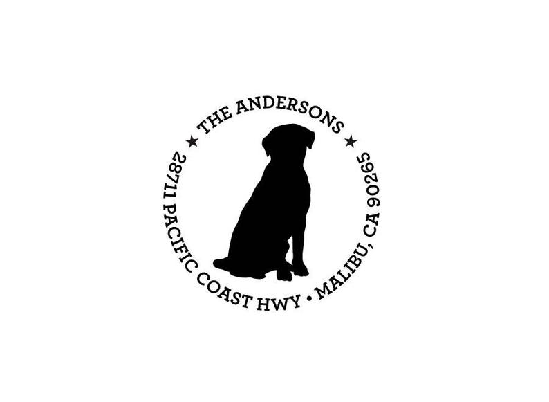 May include: Black and white silhouette of a dog sitting in a circle with the text "The Andersons 28711 Pacific Coast Hwy. Malibu, CA 90265"