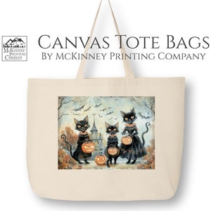 May include: A canvas tote bag featuring a whimsical illustration of three black cats dressed in costumes and carrying jack-o'-lanterns. The text "CANVAS TOTE BAGS BY MCKINNEY PRINTING COMPANY" is printed at the top of the bag.