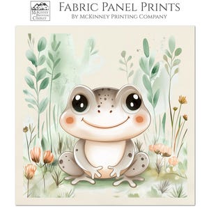 May include: Fabric panel print featuring a smiling cartoon frog with large eyes, set against a backdrop of green foliage and peach-colored flowers. The text "FABRIC PANEL PRINTS" and "COTTON (BONE)" are visible.