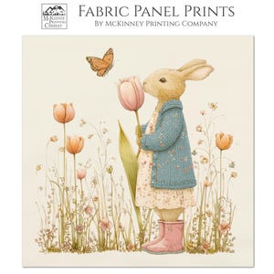May include: A fabric panel print by McKinney Printing Company featuring a rabbit wearing a blue knit cardigan and pink boots, standing in a field of tulips with a butterfly. The text reads Printed on High-Quality 100% Kona Cotton Fabric.