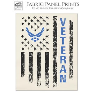 May include: A distressed American flag fabric panel print with a blue Air Force symbol and the word "VETERAN" printed vertically on the right side. The fabric is a light beige color.