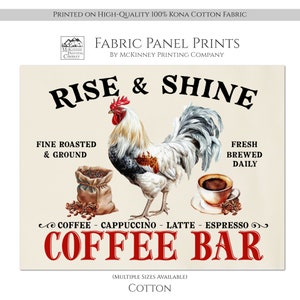 May include: A fabric panel print on 100% Kona cotton featuring a rooster illustration, a burlap sack of coffee beans, and a cup of coffee. Text includes RISE & SHINE, FINE ROASTED & GROUND, FRESH BREWED DAILY, and COFFEE BAR with coffee types.