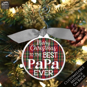 May include: Red and green plaid Christmas ornament with the text "Merry Christmas to the Best Papa Ever".