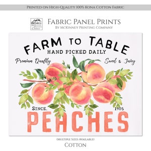 May include: A white fabric panel print with a watercolor illustration of peaches on a branch. The text "FARM TO TABLE" is in black with the words "HAND PICKED DAILY" below. The text "Premium Quality" is on the left and "Sweet & Juicy" is on the right. The text "SINCE. 1905" is below the peaches and the word "PEACHES" is in large red letters below that. The text "(MULTIPLE SIZES AVAILABLE)" is in black below the word "PEACHES" and the word "COTTON" is below that.