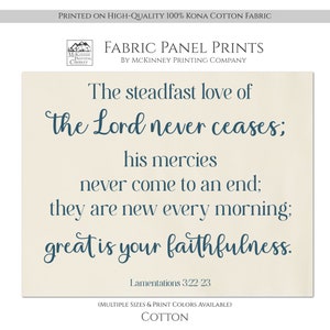 May include: A beige fabric panel print with a teal blue quote from Lamentations 3:22-23, "The steadfast love of the Lord never ceases; his mercies never come to an end; they are new every morning; great is your faithfulness."