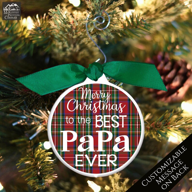 May include: Red and green plaid Christmas ornament with the text "Merry Christmas to the Best Papa Ever".