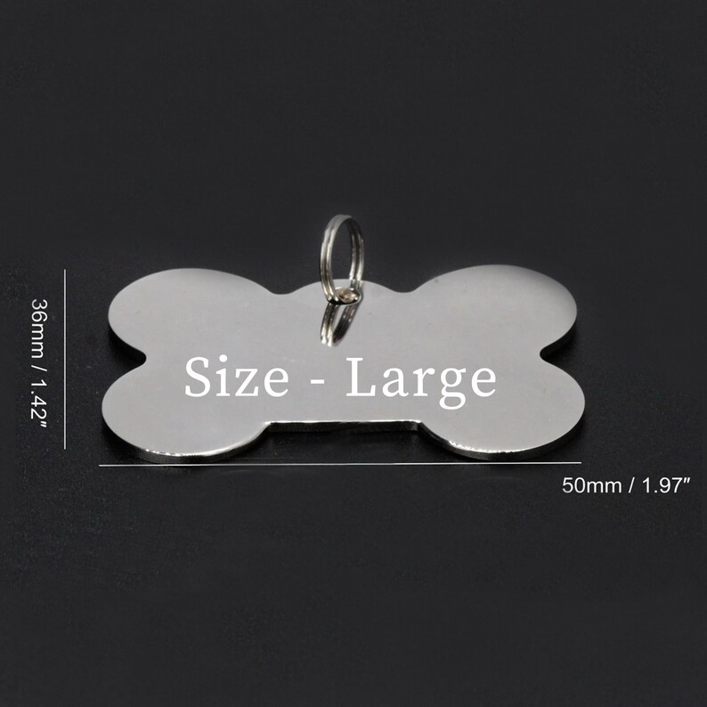 May include: Silver bone-shaped dog tag with a ring for attaching to a collar. The tag is 1.97 inches long and 1.42 inches wide. The tag is engraved with the text "Size - Large".