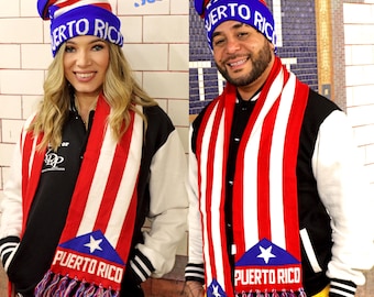 May include: A matching set of Puerto Rico themed accessories, including a blue, red, and white striped beanie with "Puerto Rico" text, and a matching scarf with the Puerto Rican flag colors and text. The scarf has a blue triangle with a white star and "Puerto Rico" text.
