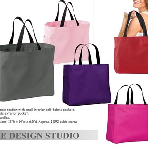 May include: A collection of tote bags in various colors: gray, pink, purple, red, and fuchsia. Each bag features black web handles and an exterior side pocket. Dimensions are approximately 12" high x 14" wide x 6.5" deep.