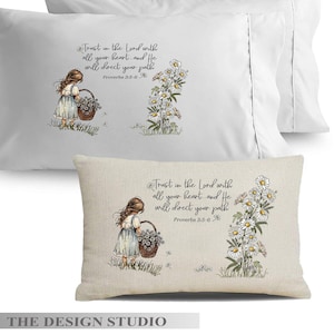 May include: White pillowcases with a floral and girl illustration. The text "Trust in the Lord with all your heart, and He will direct your path" is printed on the pillowcases. The pillowcases are a decorative item.