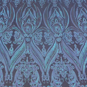 May include: A close-up of iridescent blue and white sequined fabric with a damask pattern. The fabric is sheer and has a delicate, feminine feel.
