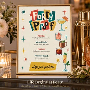 May include: A framed bar menu titled Forty Proof with colorful mid-century star accents. It lists cocktails including Paloma, Mezcal Mule, Negroni, and Prosecco Punch with ingredients, finished with the text Life just got better at the bottom.