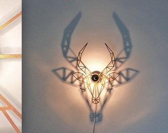 Wandlampe, Schatten, Steinbock