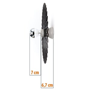 May include: Black and white wall sconce with a geometric design. The sconce is 7 inches tall and 6.7 inches wide.