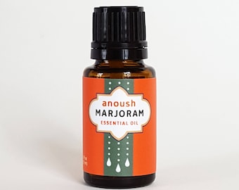 May include: A brown glass bottle of "anoush MARJORAM essential oil" with a black cap. The label is orange with white text and a decorative design. The bottle contains 0.5 fl oz (15 ml) of essential oil.