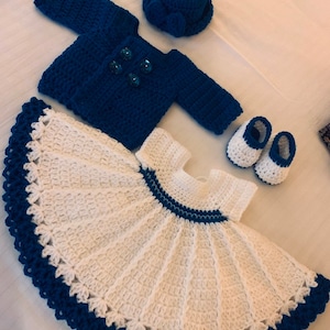 Beautiful teal crochet baby layette, comes with sweater, dress, hat and shoes